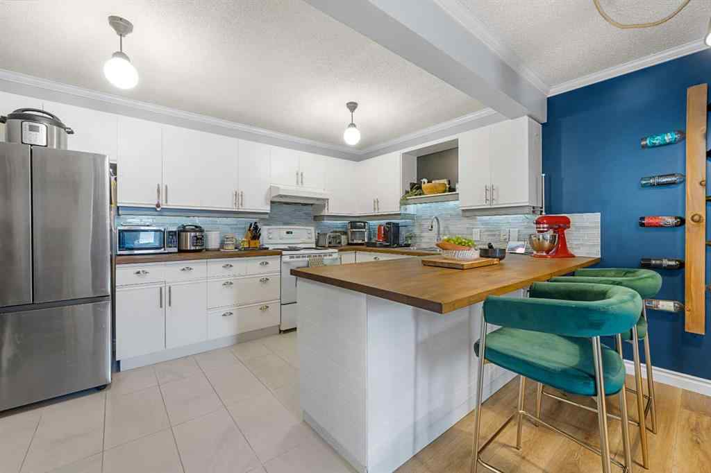 MLS® A2249517 - Unit #201 701 56 Avenue SW in Windsor Park Calgary, Residential