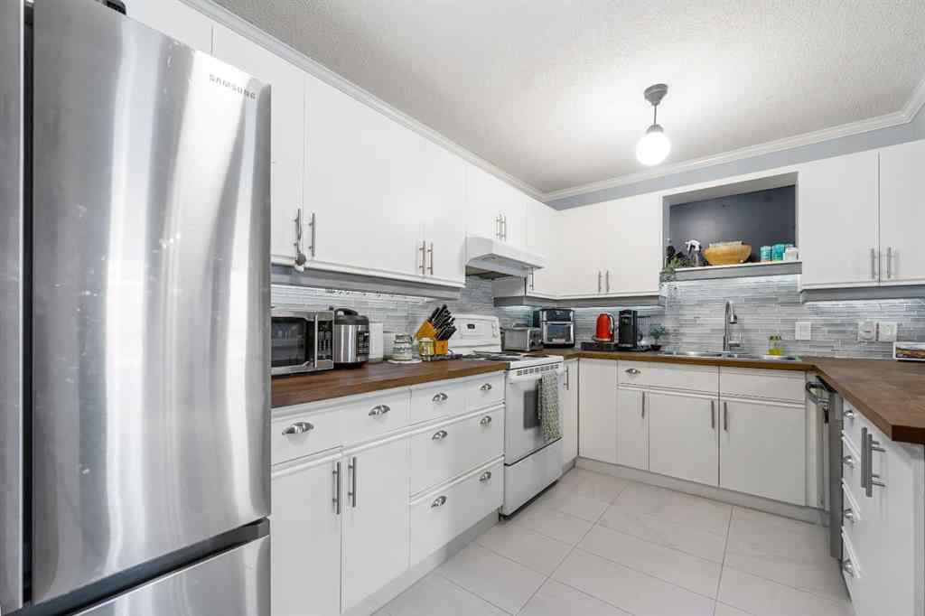 MLS® A2249517 - Unit #201 701 56 Avenue SW in Windsor Park Calgary, Residential