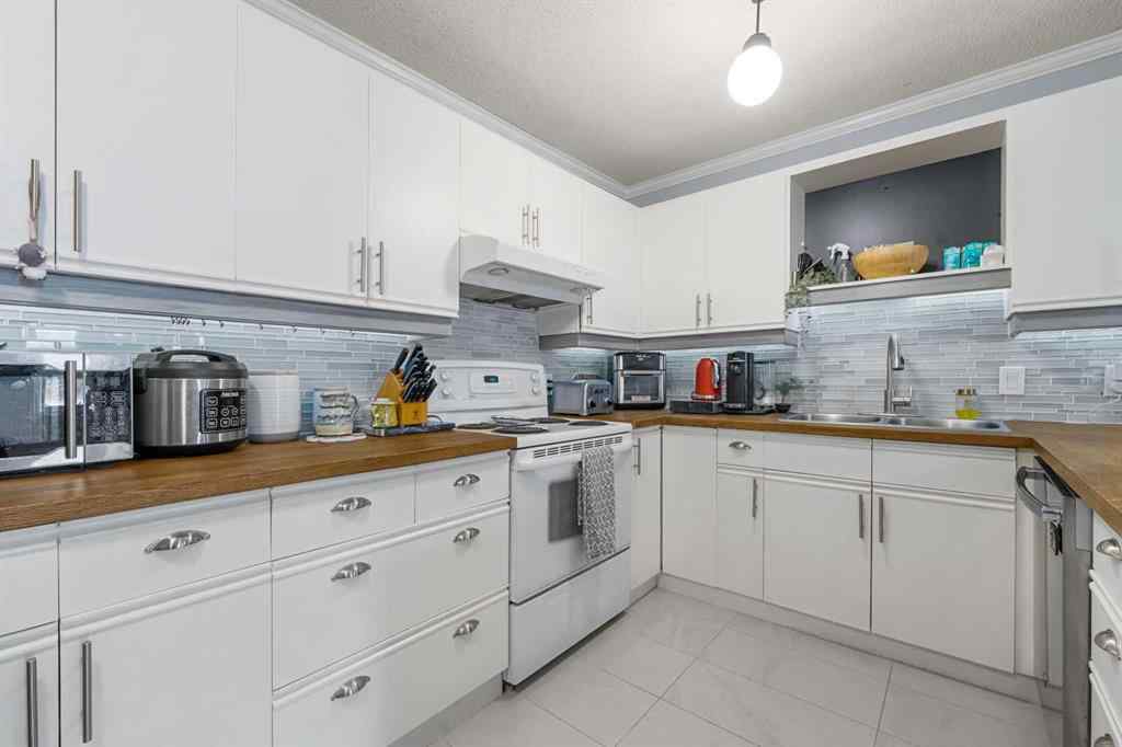 MLS® A2249517 - Unit #201 701 56 Avenue SW in Windsor Park Calgary, Residential