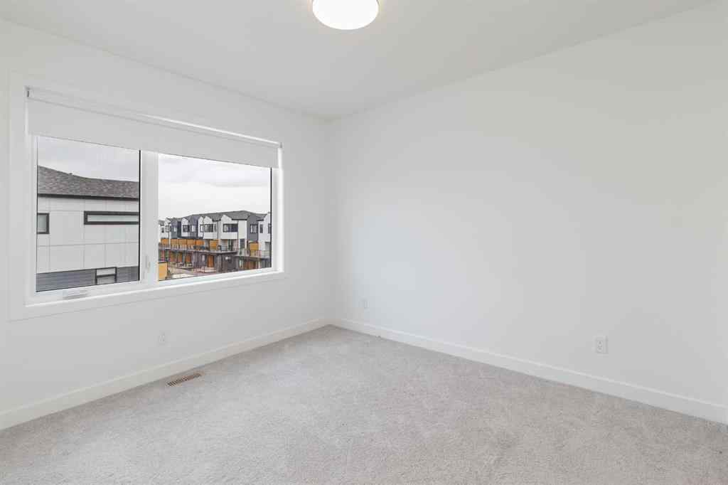 MLS® A2249525 - Unit #409 8535 19 Avenue SE in Belvedere Calgary, Residential