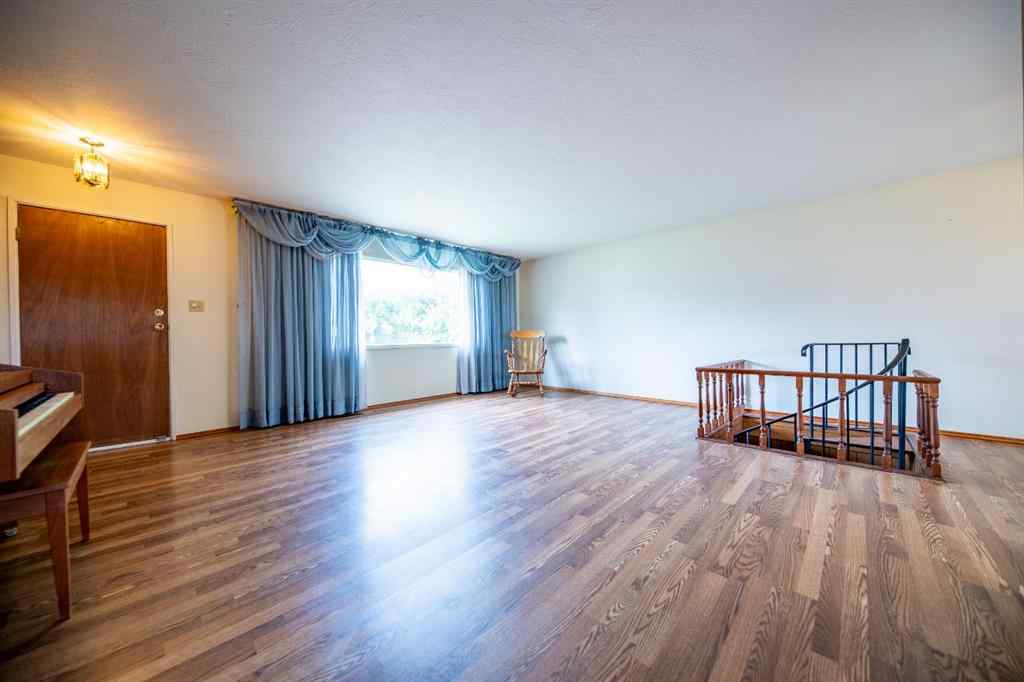 MLS® A2249532 - 9527 98 Avenue  in Smith Grande Prairie, Residential