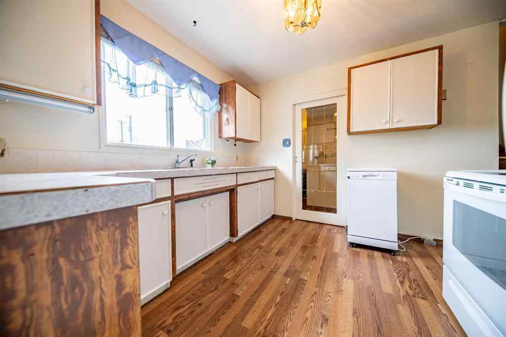 MLS® A2249532 - 9527 98 Avenue  in Smith Grande Prairie, Residential