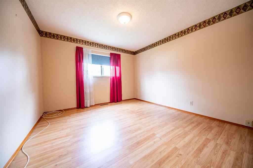 MLS® A2249532 - 9527 98 Avenue  in Smith Grande Prairie, Residential