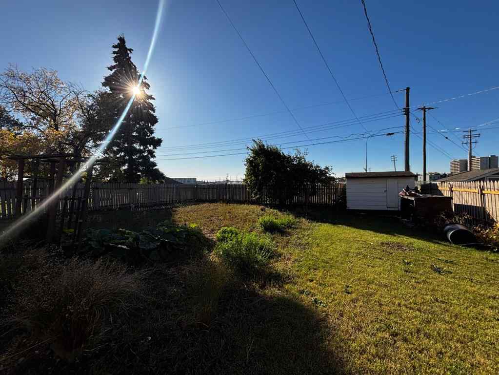 MLS® A2249532 - 9527 98 Avenue  in Smith Grande Prairie, Residential