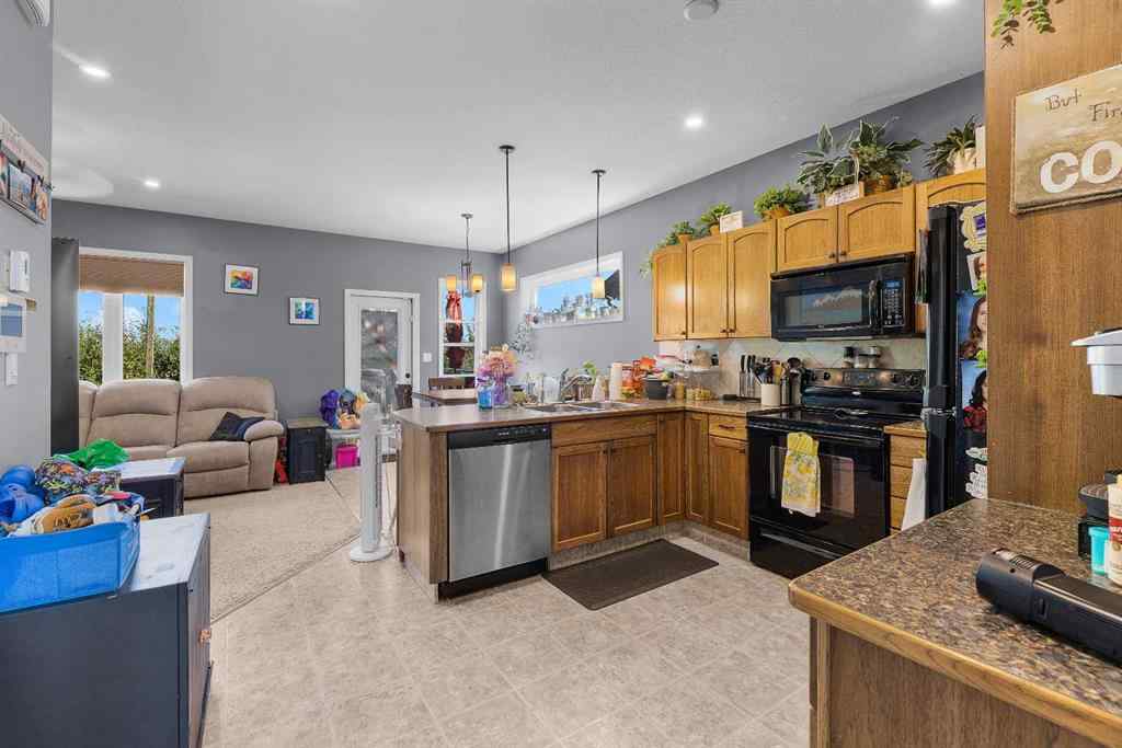 MLS® A2249543 - Unit #8 4546 Iron Wolf Place  in Iron Wolf Lacombe, Residential