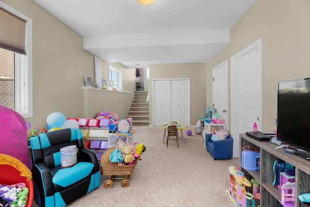 MLS® A2249543 - Unit #8 4546 Iron Wolf Place  in Iron Wolf Lacombe, Residential