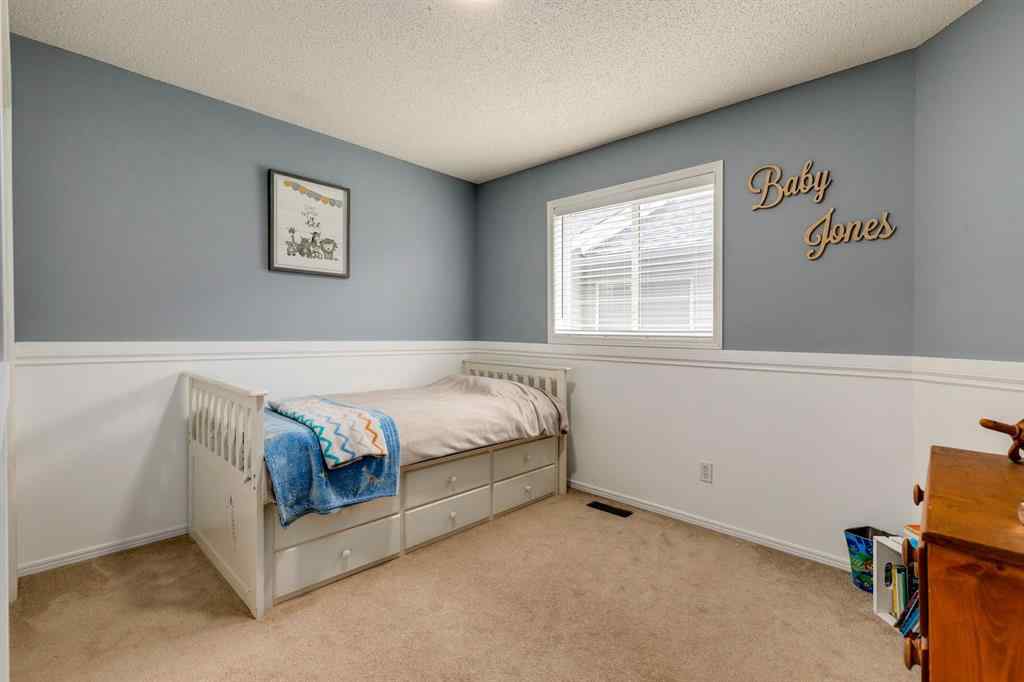 MLS® A2249573 - 1209 Kingsland Road SE in Kings Heights Airdrie, Residential