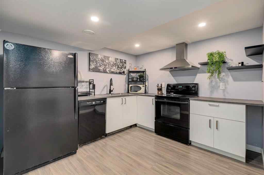 MLS® A2249573 - 1209 Kingsland Road SE in Kings Heights Airdrie, Residential