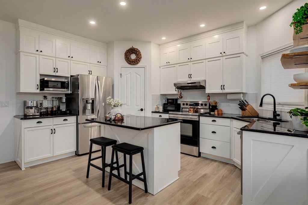 MLS® A2249573 - 1209 Kingsland Road SE in Kings Heights Airdrie, Residential