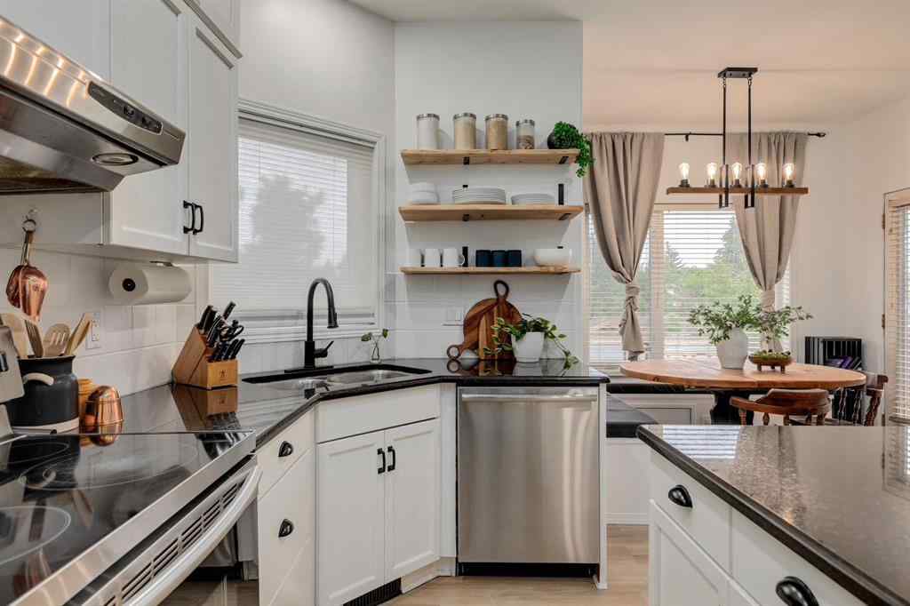 MLS® A2249573 - 1209 Kingsland Road SE in Kings Heights Airdrie, Residential