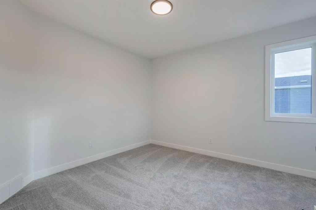 MLS® A2249603 - 54 Amblefield Common NW in Moraine Calgary, Residential