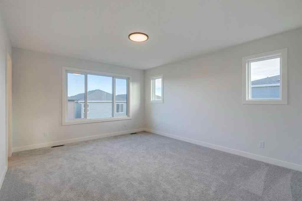 MLS® A2249603 - 54 Amblefield Common NW in Moraine Calgary, Residential