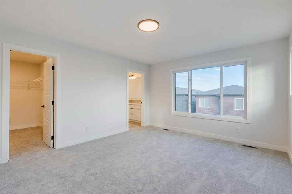 MLS® A2249603 - 54 Amblefield Common NW in Moraine Calgary, Residential