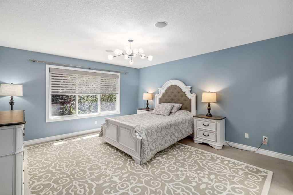 MLS® A2249604 - 12481 Crestmont Boulevard SW in Crestmont Calgary, Residential