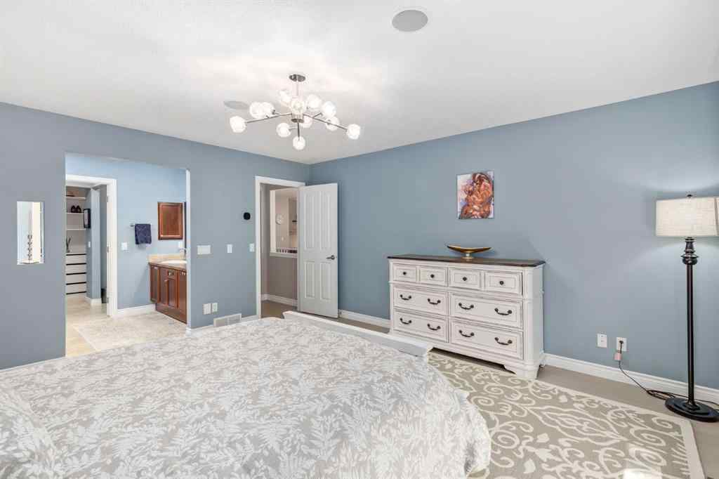 MLS® A2249604 - 12481 Crestmont Boulevard SW in Crestmont Calgary, Residential