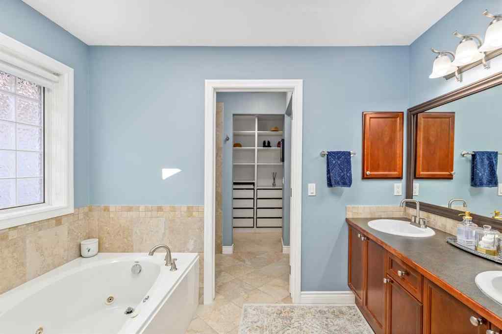 MLS® A2249604 - 12481 Crestmont Boulevard SW in Crestmont Calgary, Residential