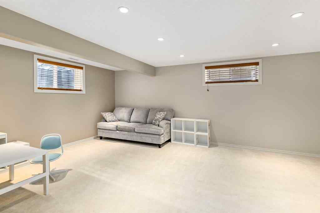 MLS® A2249604 - 12481 Crestmont Boulevard SW in Crestmont Calgary, Residential