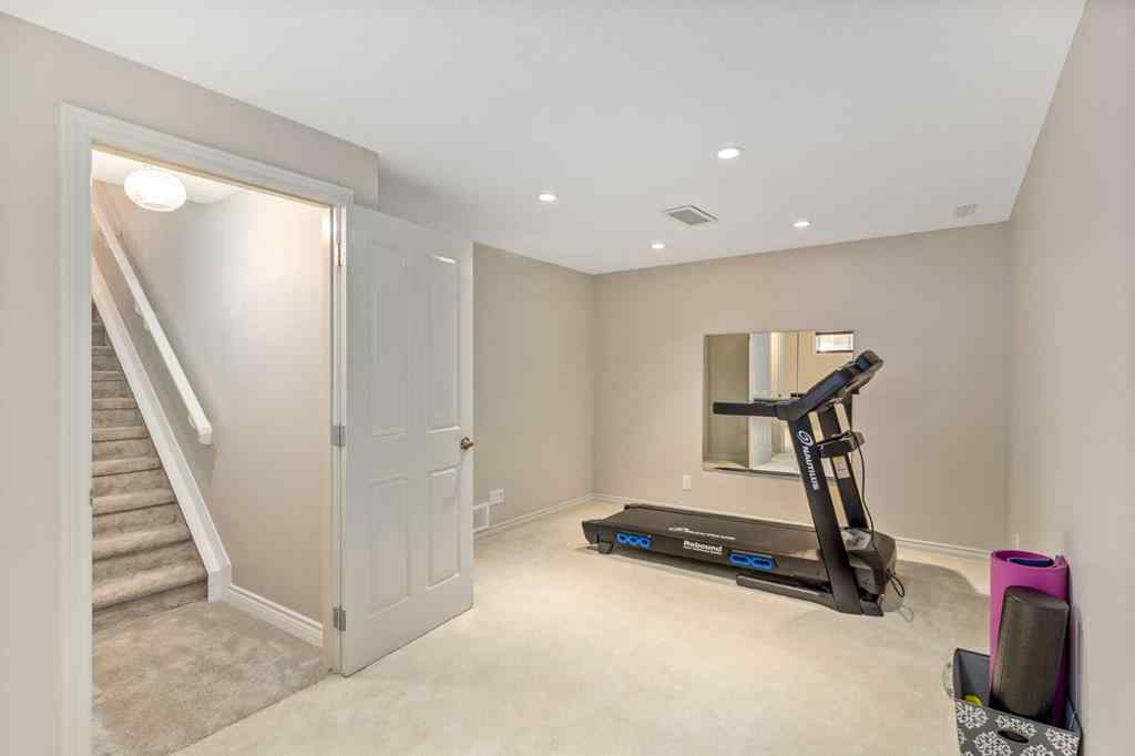 MLS® A2249604 - 12481 Crestmont Boulevard SW in Crestmont Calgary, Residential