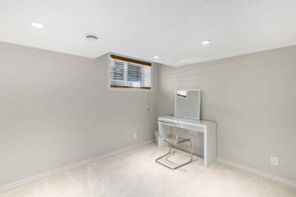 MLS® A2249604 - 12481 Crestmont Boulevard SW in Crestmont Calgary, Residential