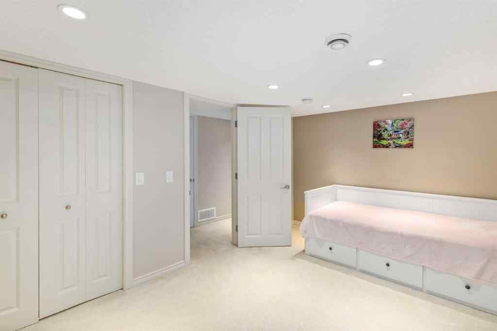 MLS® A2249604 - 12481 Crestmont Boulevard SW in Crestmont Calgary, Residential