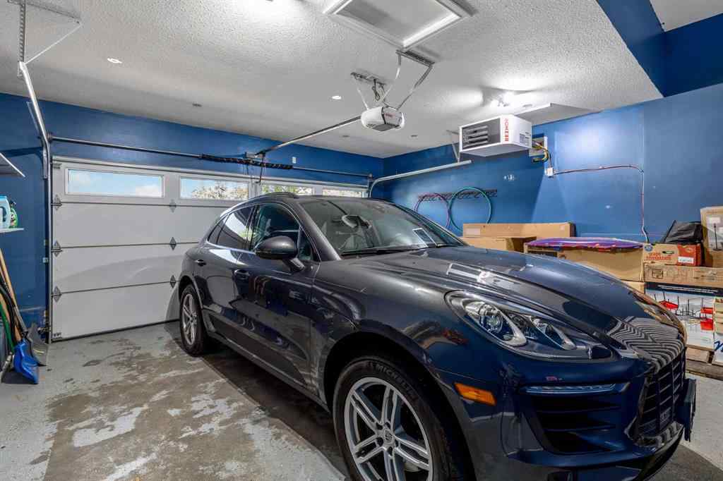 MLS® A2249604 - 12481 Crestmont Boulevard SW in Crestmont Calgary, Residential
