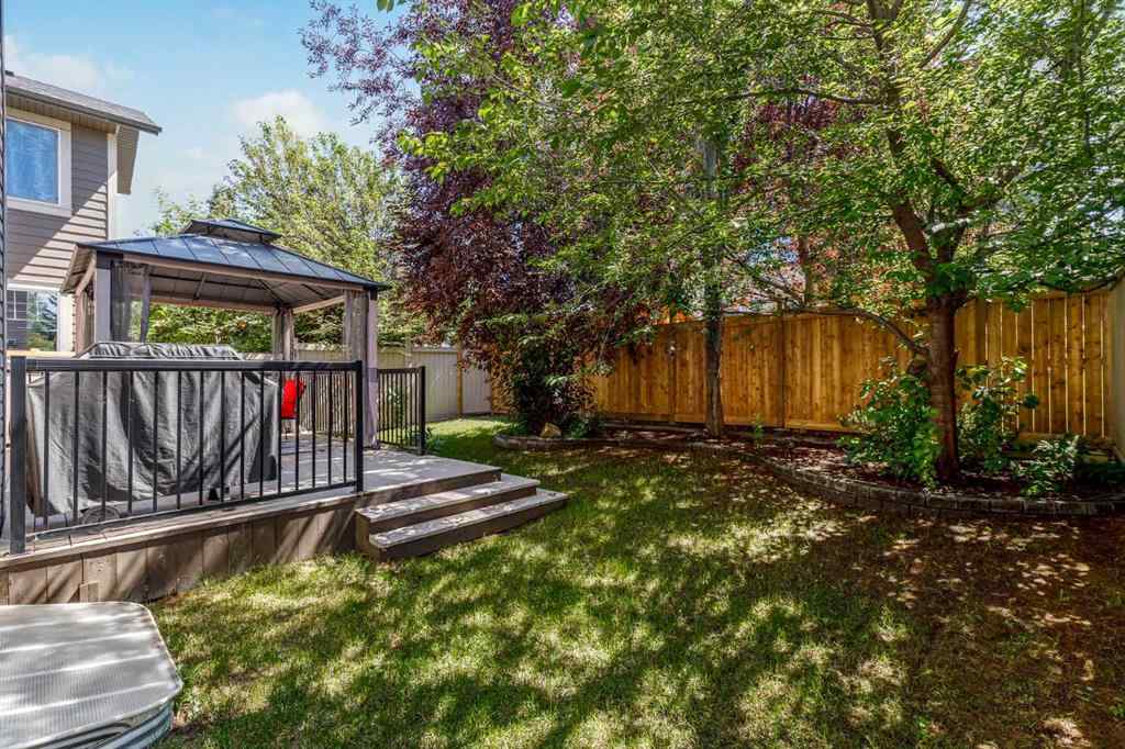 MLS® A2249604 - 12481 Crestmont Boulevard SW in Crestmont Calgary, Residential