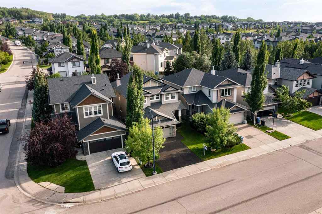 MLS® A2249604 - 12481 Crestmont Boulevard SW in Crestmont Calgary, Residential