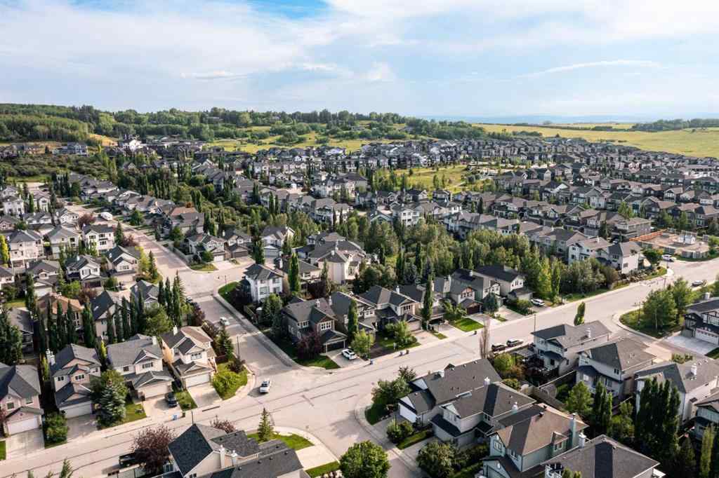 MLS® A2249604 - 12481 Crestmont Boulevard SW in Crestmont Calgary, Residential