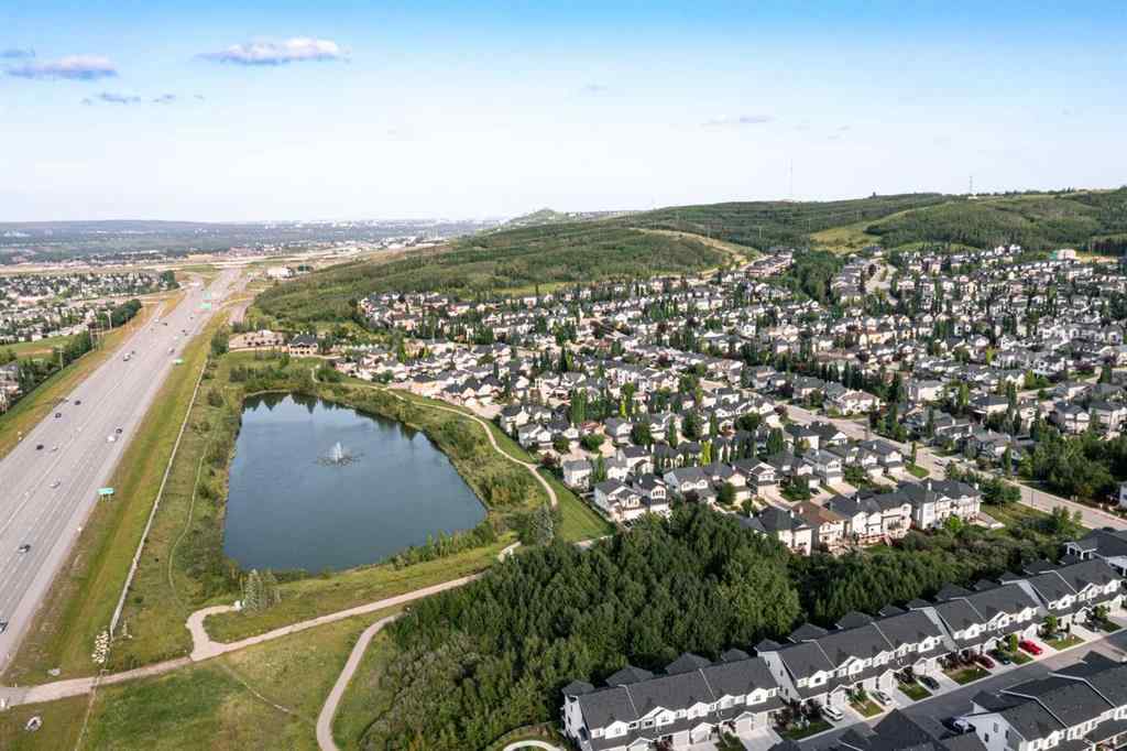 MLS® A2249604 - 12481 Crestmont Boulevard SW in Crestmont Calgary, Residential