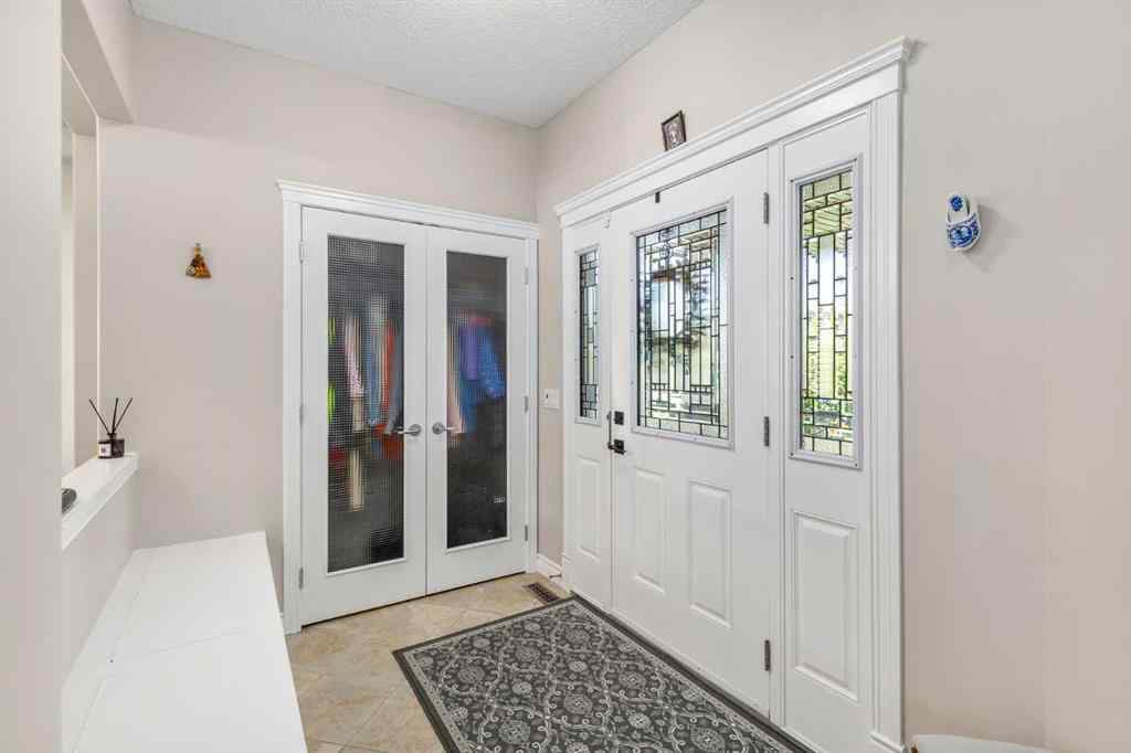 MLS® A2249604 - 12481 Crestmont Boulevard SW in Crestmont Calgary, Residential