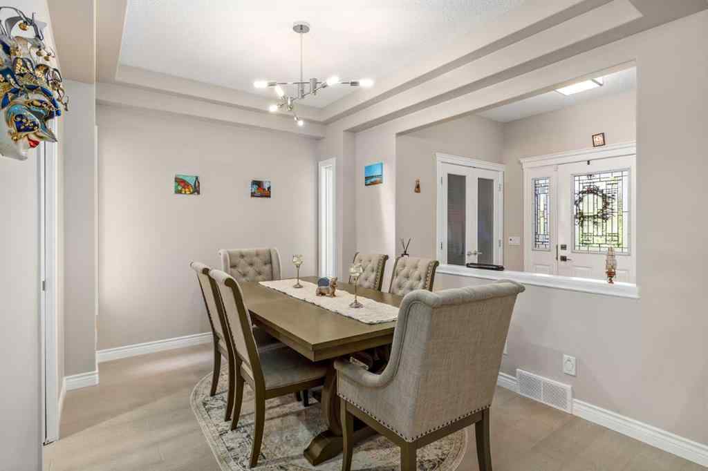 MLS® A2249604 - 12481 Crestmont Boulevard SW in Crestmont Calgary, Residential