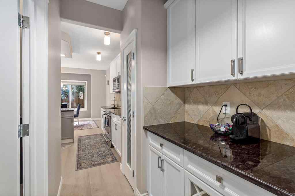 MLS® A2249604 - 12481 Crestmont Boulevard SW in Crestmont Calgary, Residential