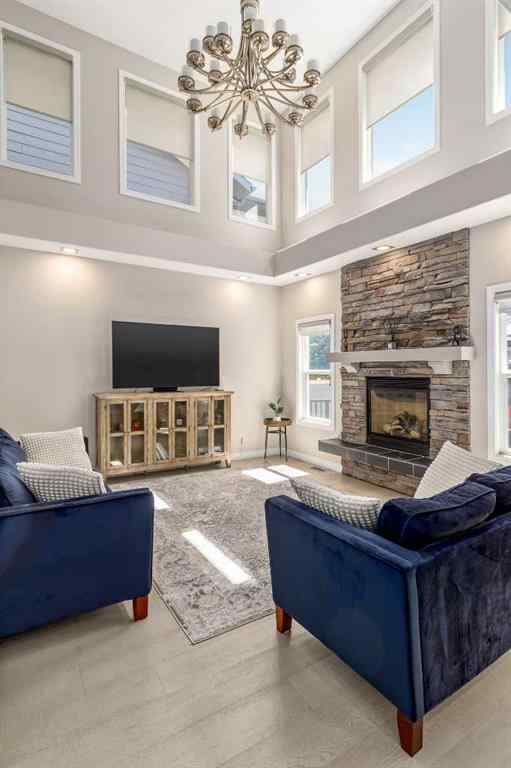 MLS® A2249604 - 12481 Crestmont Boulevard SW in Crestmont Calgary, Residential