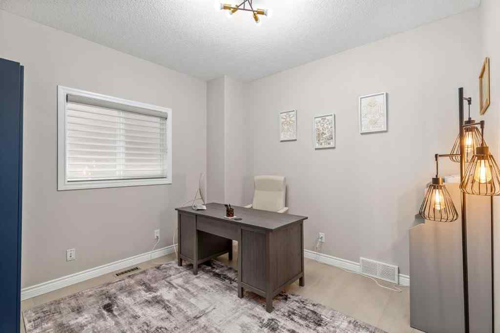MLS® A2249604 - 12481 Crestmont Boulevard SW in Crestmont Calgary, Residential