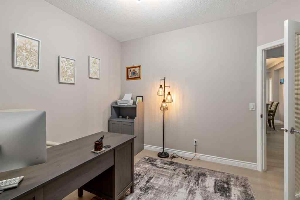 MLS® A2249604 - 12481 Crestmont Boulevard SW in Crestmont Calgary, Residential