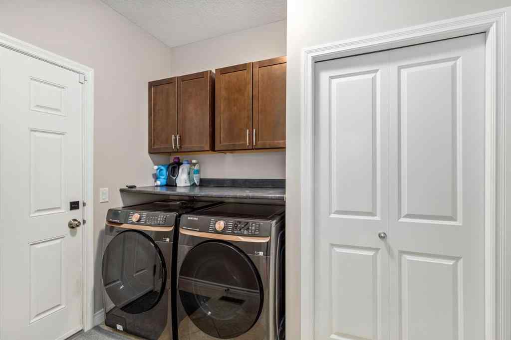 MLS® A2249604 - 12481 Crestmont Boulevard SW in Crestmont Calgary, Residential