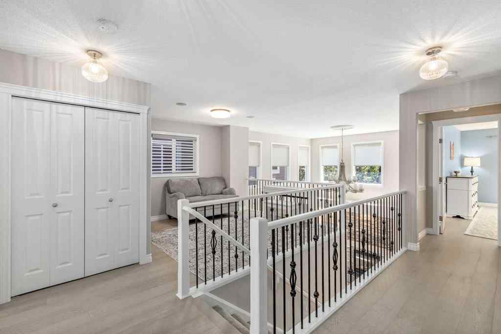 MLS® A2249604 - 12481 Crestmont Boulevard SW in Crestmont Calgary, Residential