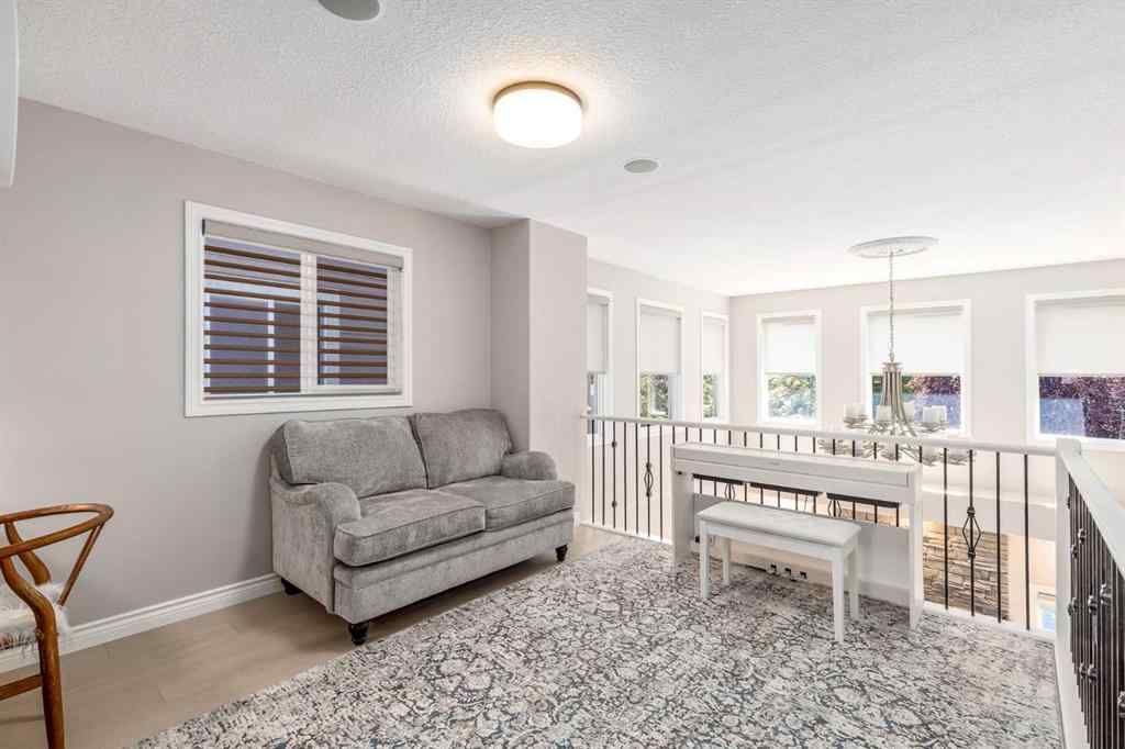 MLS® A2249604 - 12481 Crestmont Boulevard SW in Crestmont Calgary, Residential