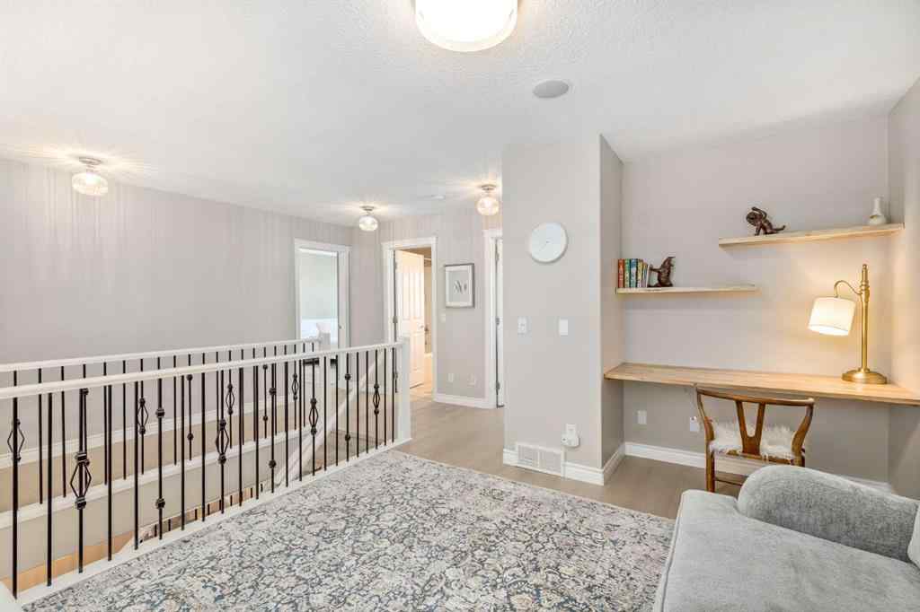 MLS® A2249604 - 12481 Crestmont Boulevard SW in Crestmont Calgary, Residential