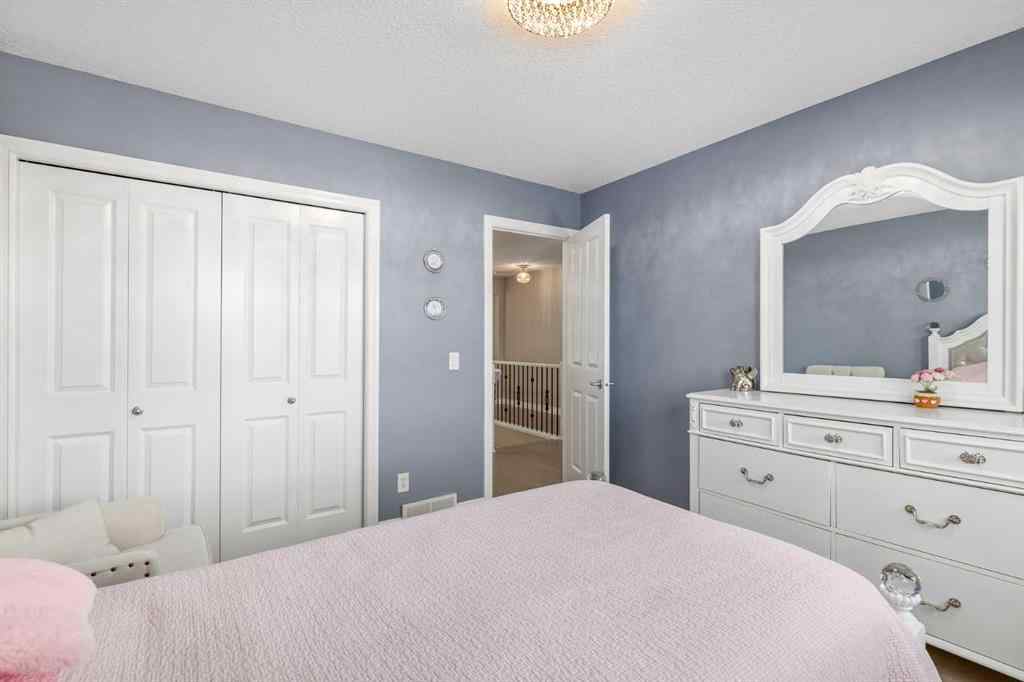 MLS® A2249604 - 12481 Crestmont Boulevard SW in Crestmont Calgary, Residential