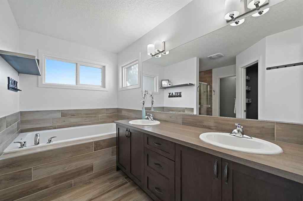MLS® A2249611 - 89 Sunrise Crescent  in Sunset Ridge Cochrane, Residential