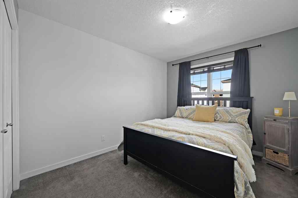 MLS® A2249611 - 89 Sunrise Crescent  in Sunset Ridge Cochrane, Residential