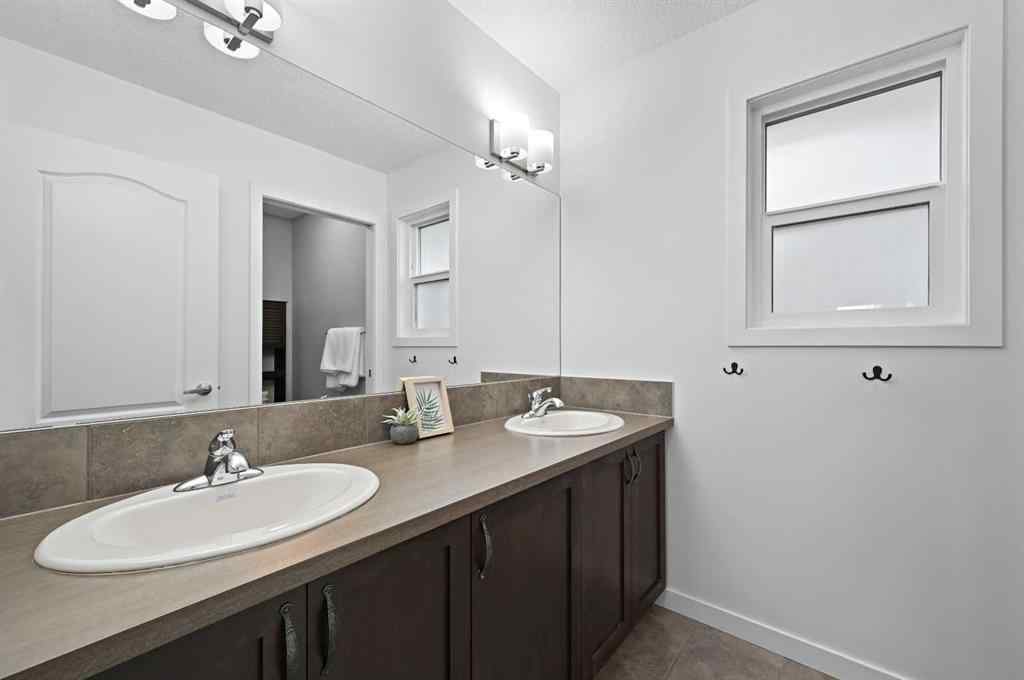 MLS® A2249611 - 89 Sunrise Crescent  in Sunset Ridge Cochrane, Residential