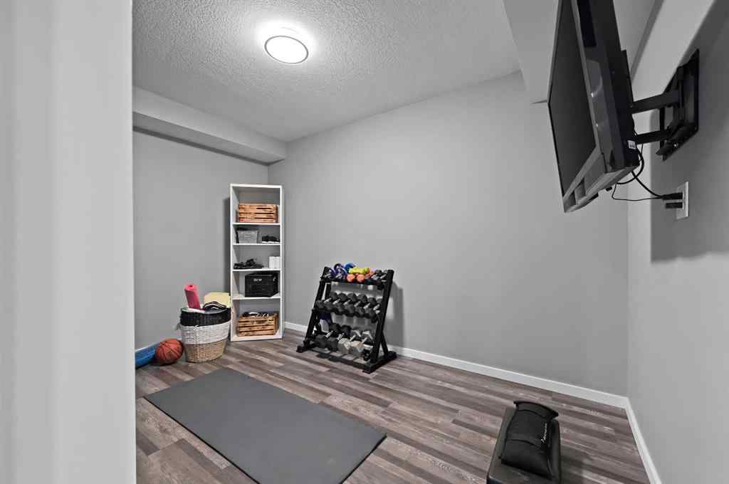 MLS® A2249611 - 89 Sunrise Crescent  in Sunset Ridge Cochrane, Residential