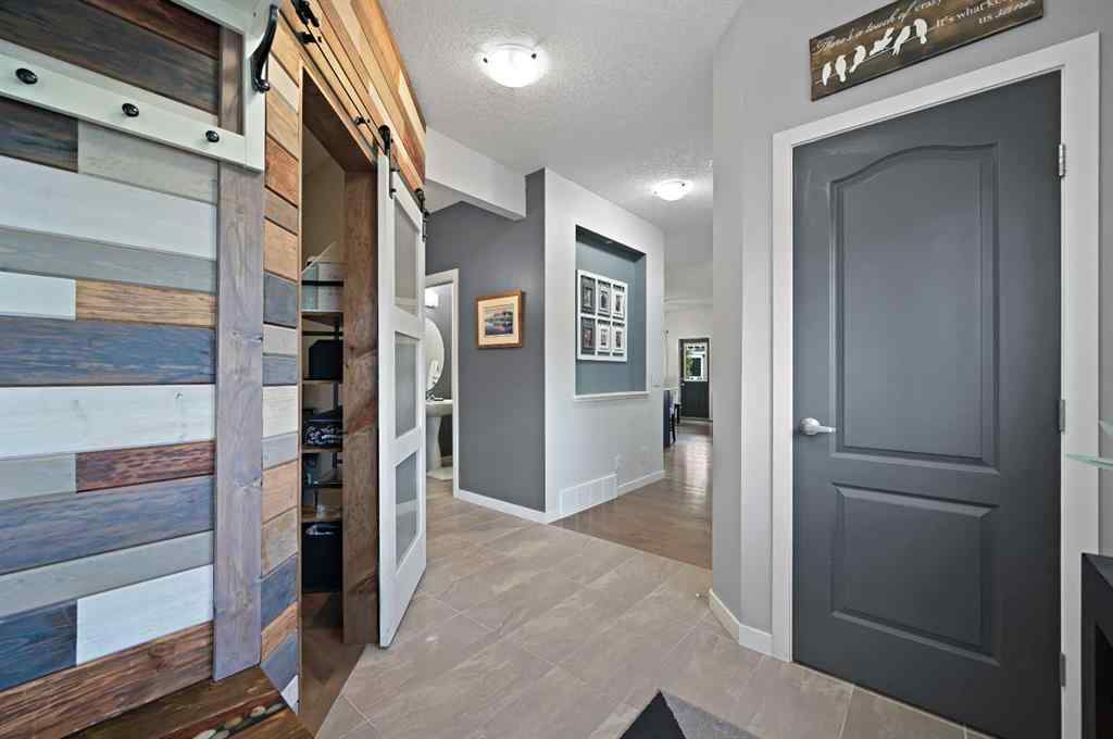 MLS® A2249611 - 89 Sunrise Crescent  in Sunset Ridge Cochrane, Residential