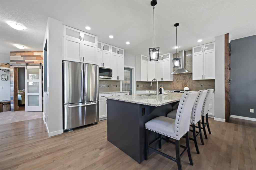 MLS® A2249611 - 89 Sunrise Crescent  in Sunset Ridge Cochrane, Residential