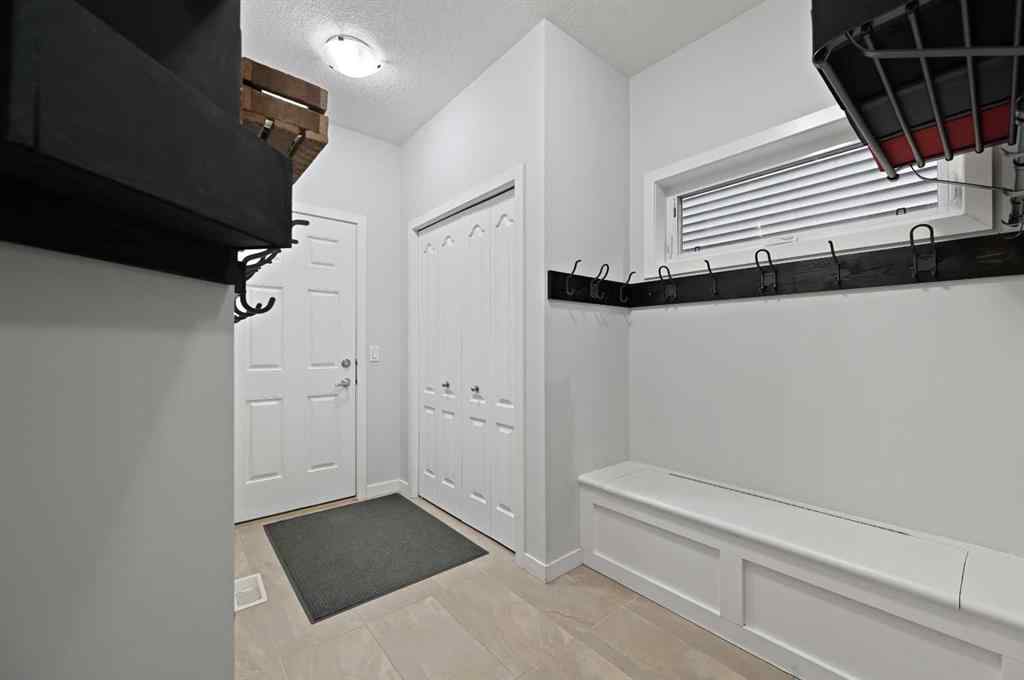 MLS® A2249611 - 89 Sunrise Crescent  in Sunset Ridge Cochrane, Residential