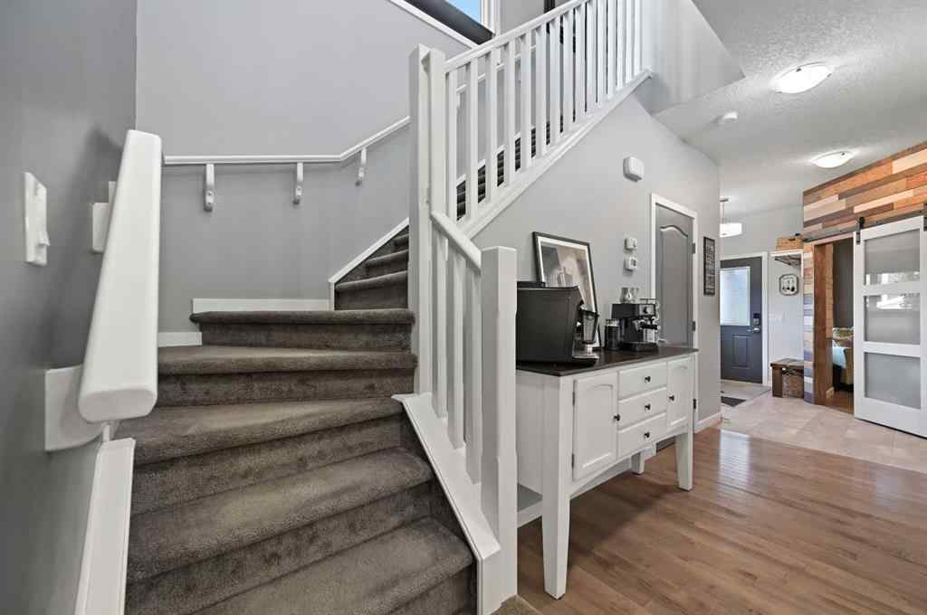MLS® A2249611 - 89 Sunrise Crescent  in Sunset Ridge Cochrane, Residential