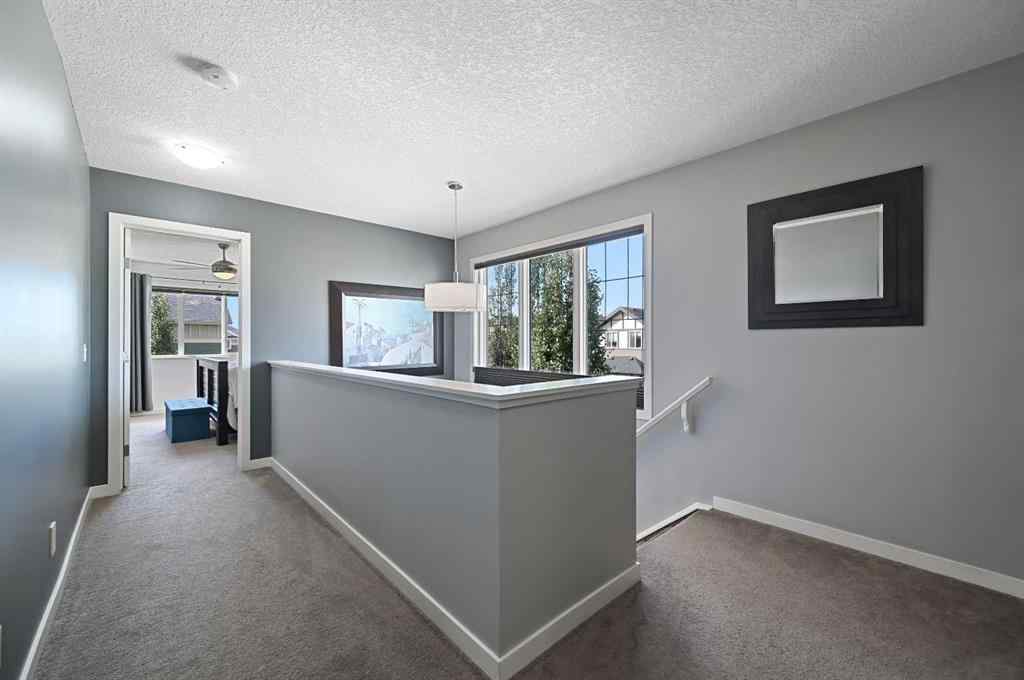MLS® A2249611 - 89 Sunrise Crescent  in Sunset Ridge Cochrane, Residential