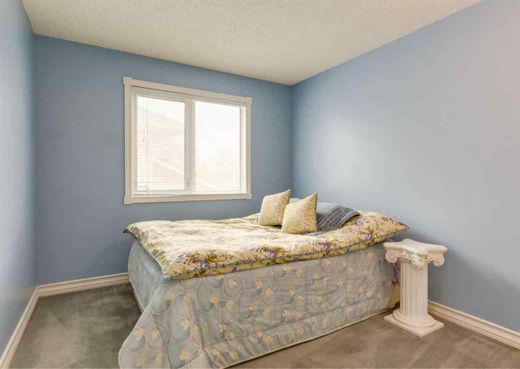MLS® A2249623 - 164 Hawksbrow Drive NW in Hawkwood Calgary, Residential